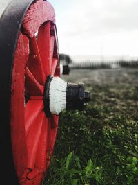 Close-up of vintage car on field