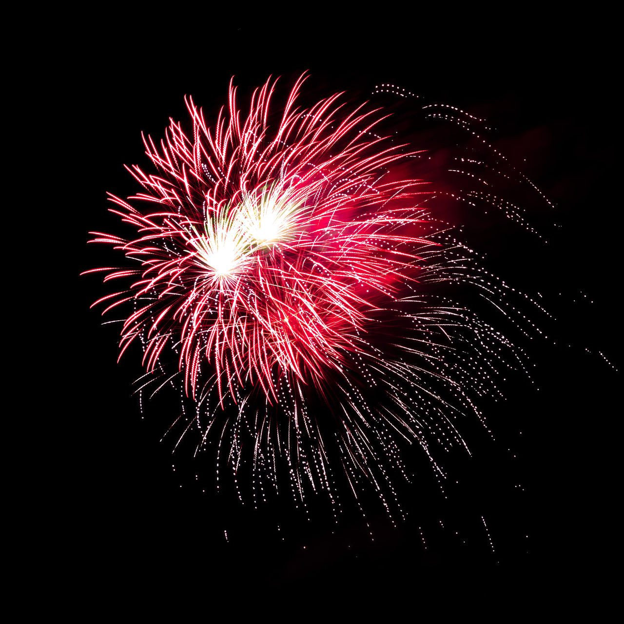fireworks, motion, firework display, celebration, night, event, exploding, arts culture and entertainment, illuminated, glowing, recreation, no people, low angle view, sky, nature, long exposure, firework - man made object, blurred motion, multi colored, red, outdoors, dark