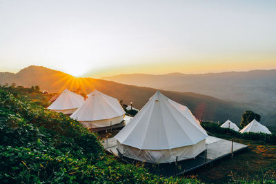 Scenic view of mountains against sky during sunset