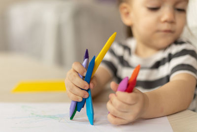 Close-up of girl painting