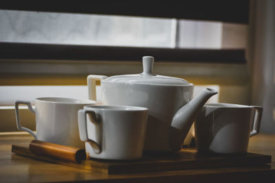 Close-up of coffee cup on table