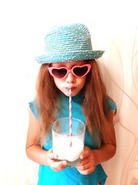 Portrait of woman drinking glasses