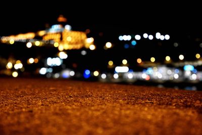 Defocused image of illuminated lights at night