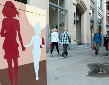 Full length of woman standing in city