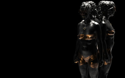 Close-up of statue against black background