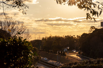 High angle view of road against sky at sunset