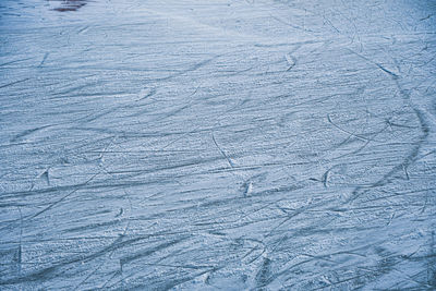 Ice in skate scratches, close view