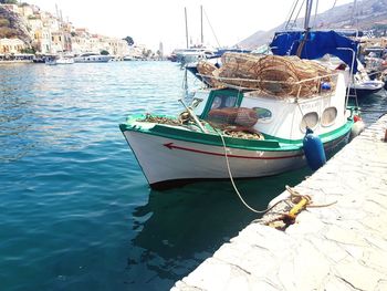 Fishing boat moored at harbor