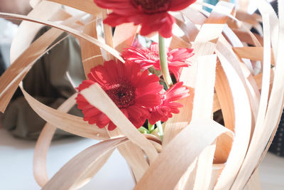 Close-up of red rose on table