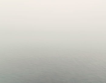 Scenic view of water against sky