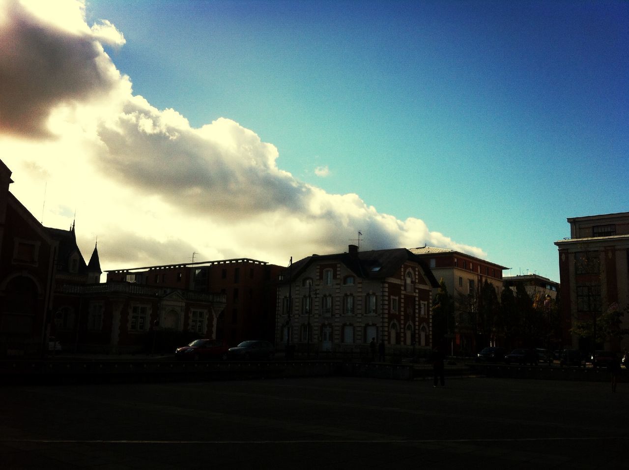 architecture, building exterior, built structure, sky, cloud - sky, cloud, blue, building, city, house, outdoors, residential structure, street, no people, history, road, day, residential building, transportation, dusk