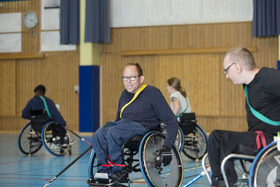 Disabled people playing in gym