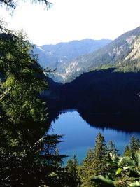 Scenic view of lake with mountains in background