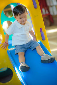 Boy playing in playground