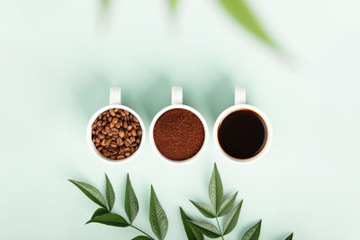 Close-up of coffee beans on white background