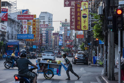 People on street in city