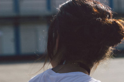 Close-up, rear view of young woman