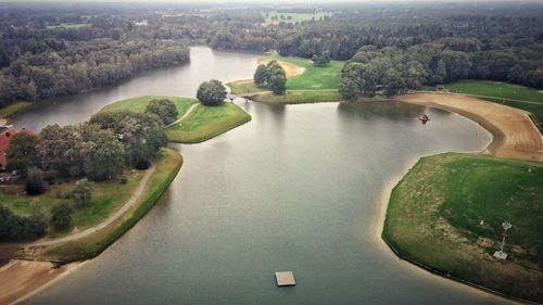 High angle view of lake amidst trees