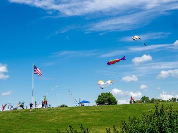 Scenic view of kite flying