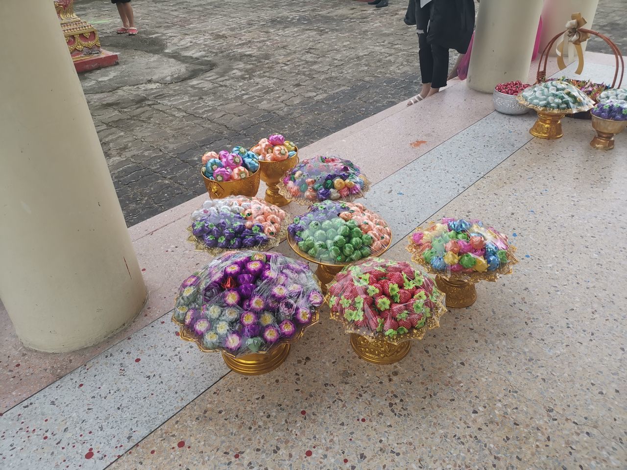 HIGH ANGLE VIEW OF MULTI COLORED UMBRELLAS ON TABLE