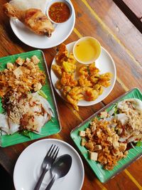 High angle view of food served on table