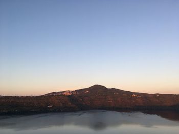 Scenic view of mountains against clear blue sky