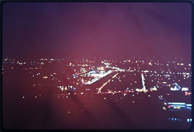 Illuminated cityscape at night