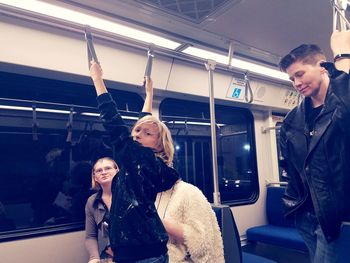 Young woman sitting in train