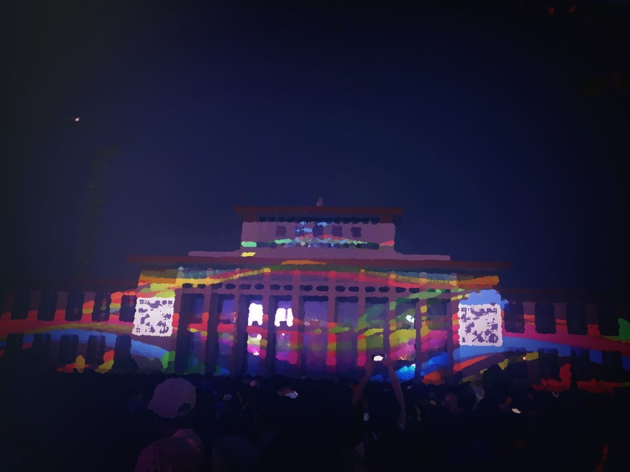 night, illuminated, large group of people, copy space, built structure, text, building exterior, lifestyles, architecture, leisure activity, crowd, advertisement, city, person, city life, commercial sign, group of people, sky, in front of, neon, brandenburg gate, outdoors, tourism, nightlife