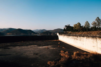 Scenic view of landscape against clear blue sky