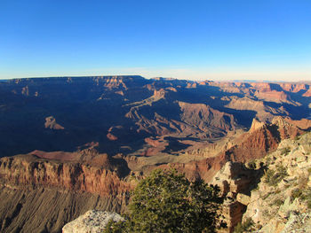 Scenic view of the grand canyon  against blue sky