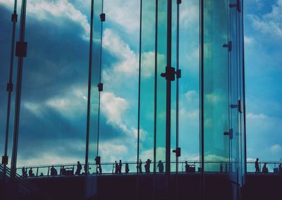 Low angle view of sky seen through glass window
