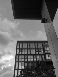 Low angle view of modern building against sky