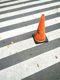 Close-up of zebra crossing on road