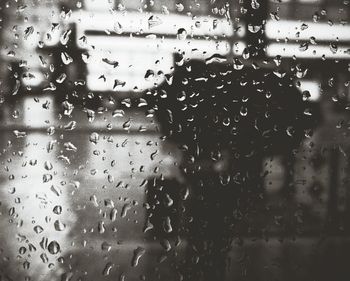 Close-up of water drops on glass