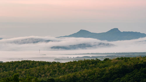 Scenic view of mountains against sky during sunset