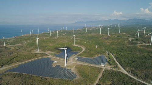 Aerial view of windmills for electric power production on the seashore. bangui windmills 