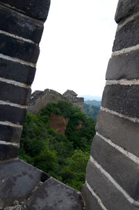 Great wall of china against sky seen through window