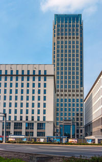 Low angle view of buildings against sky in city