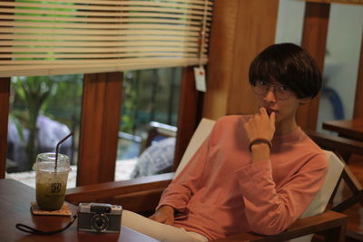 Woman sitting in restaurant