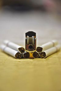 Close-up of cigarette on table