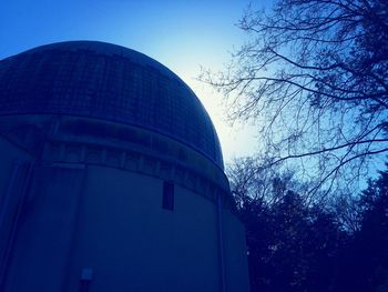 Low angle view of built structure against blue sky