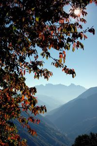 Low angle view of mountain against cloudy sky