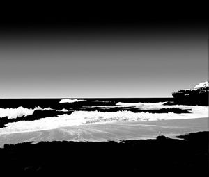 Scenic view of sea against sky during winter