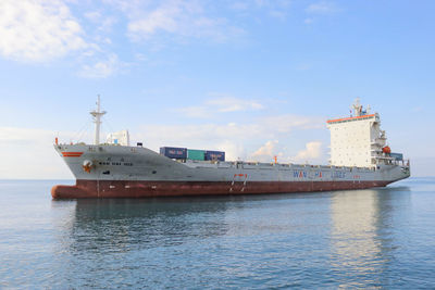 Ship in sea against sky