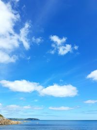 Scenic view of sea against cloudy sky