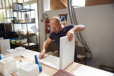 Man working on table