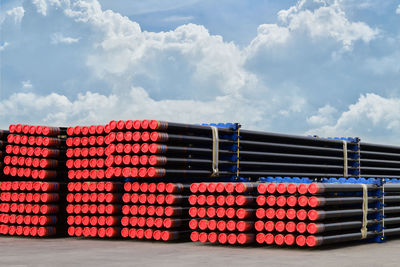 Rows of steel pipes storage and stacking for industrial construction.