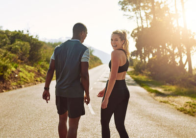 Couple walking on road