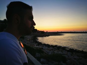 Portrait of man against sky during sunset